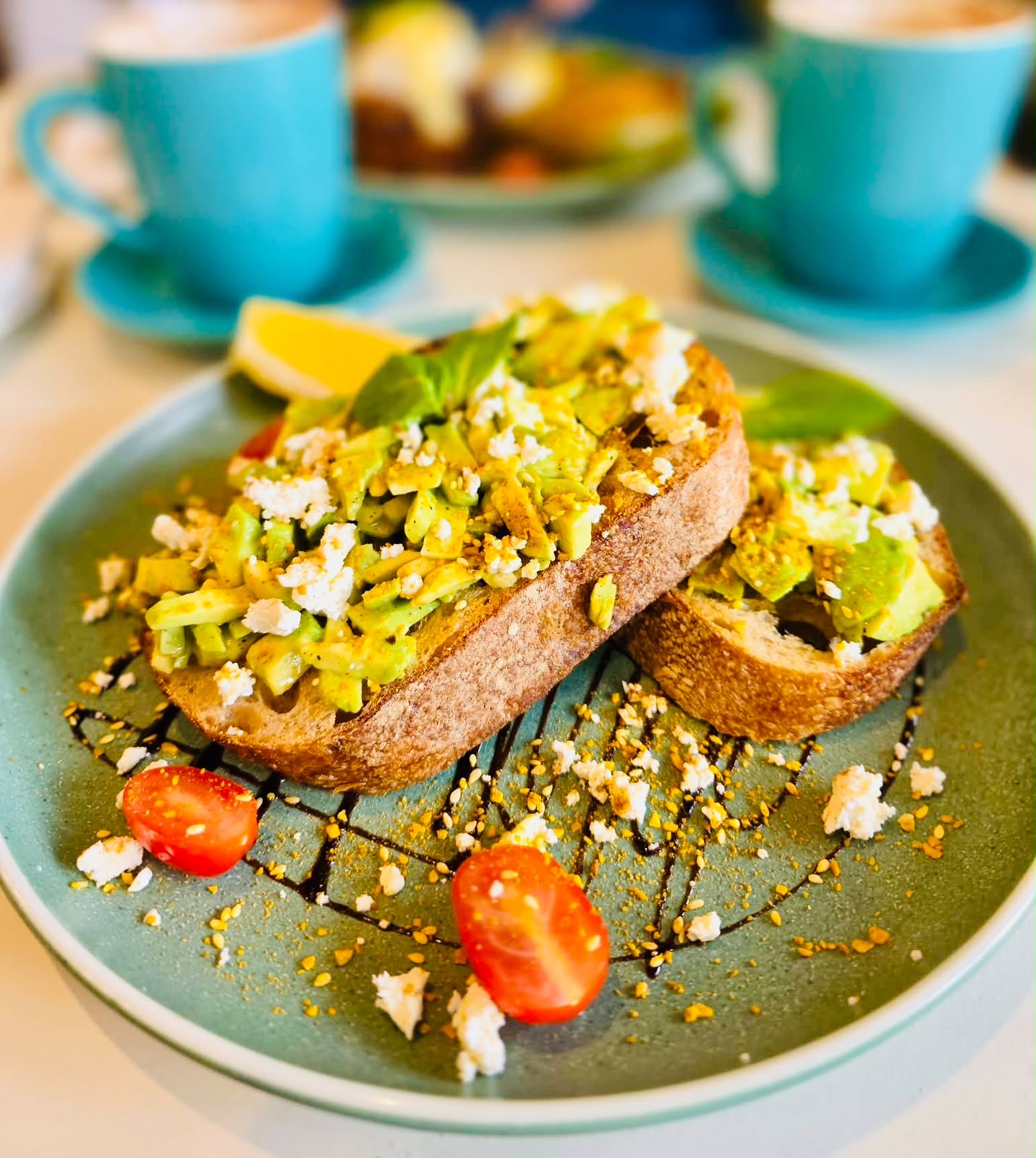 Smashed avocado and feta on toasted sourdough
