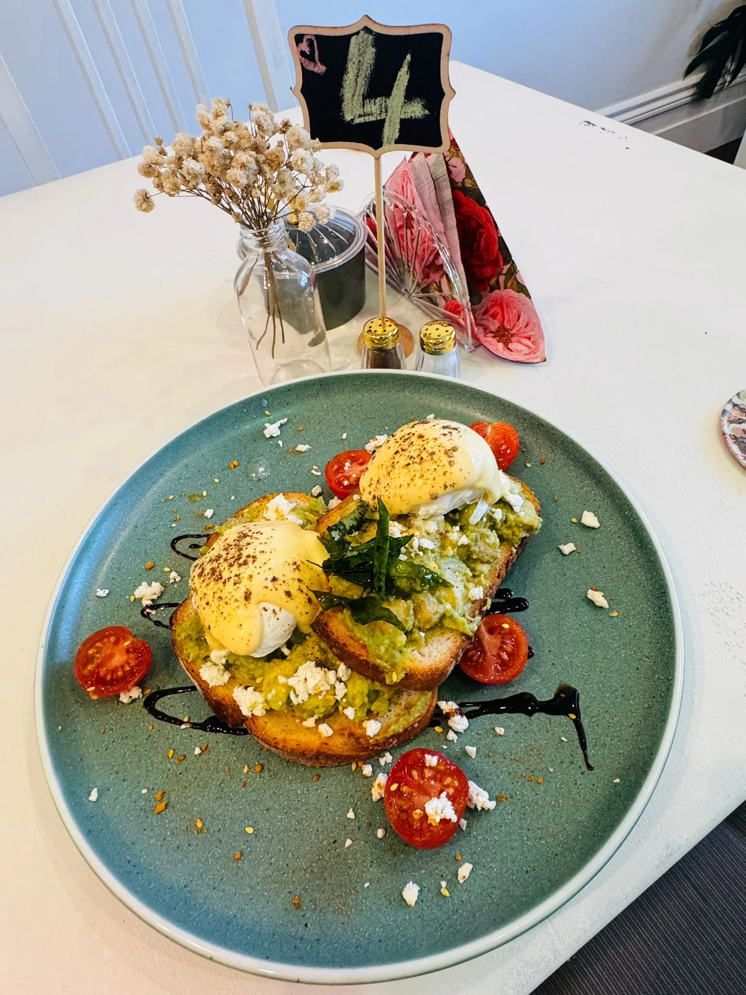Smashed avocado toast with poached eggs