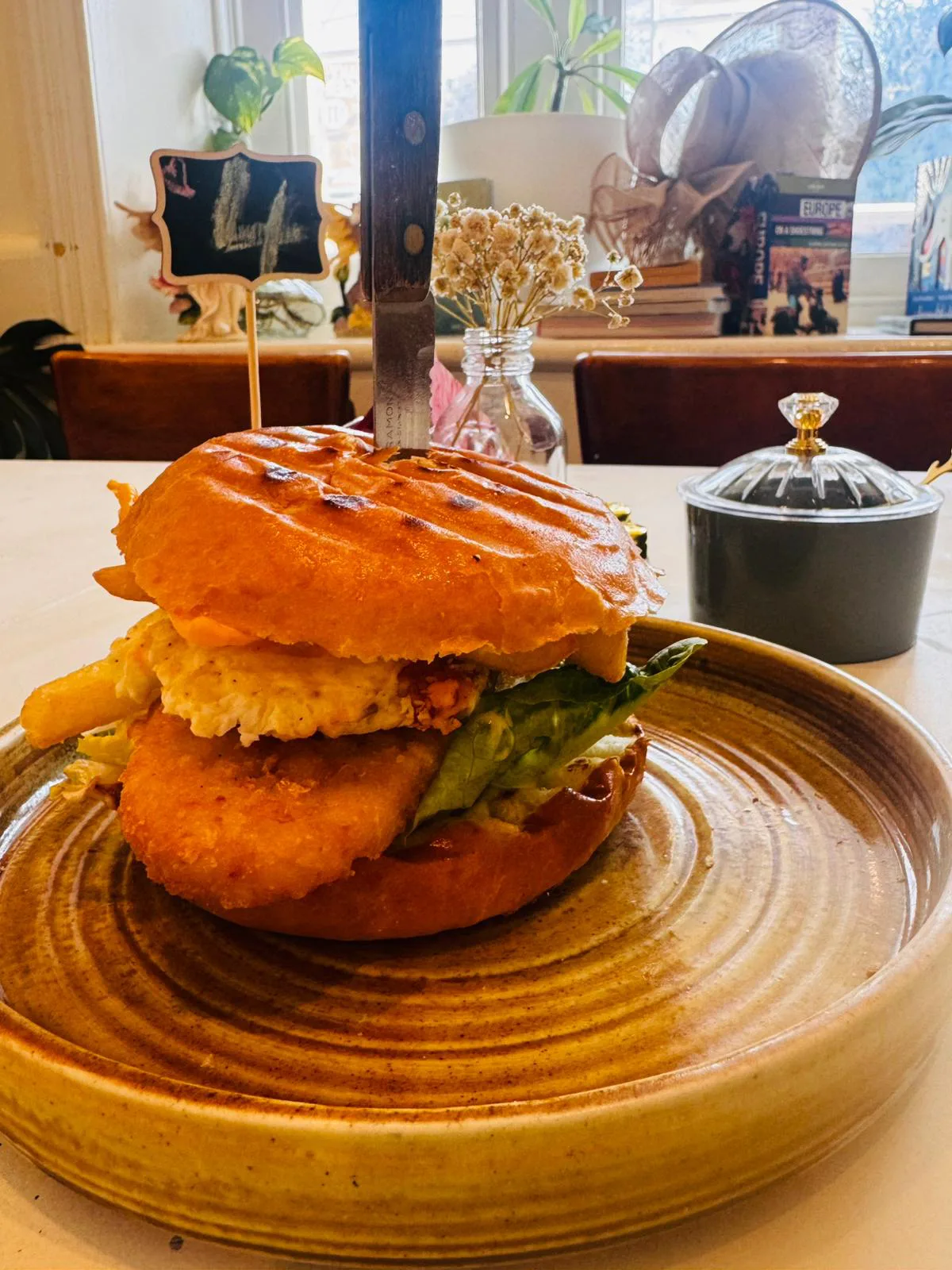 Crispy chicken burger served at the café