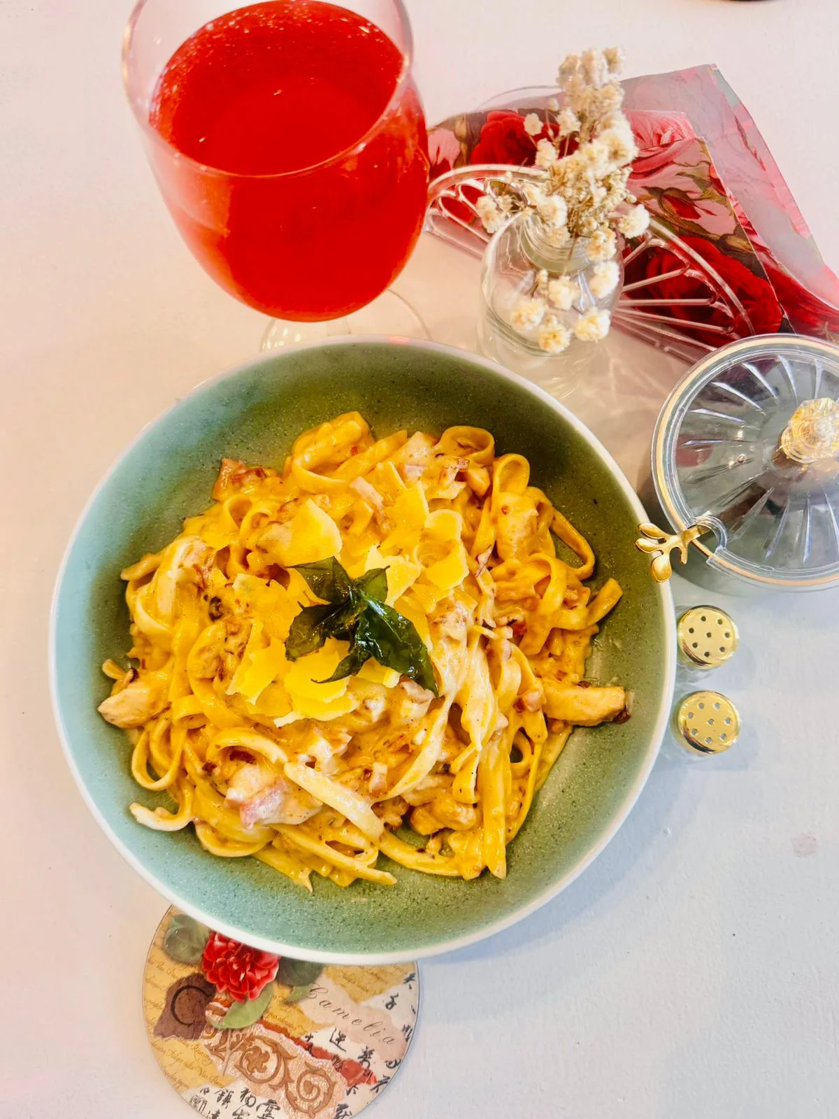 Creamy pasta with parmesan served at Save For A Date Café
